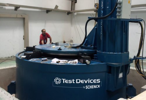 Man operating Test Devices by SCHENCK spin testing machine