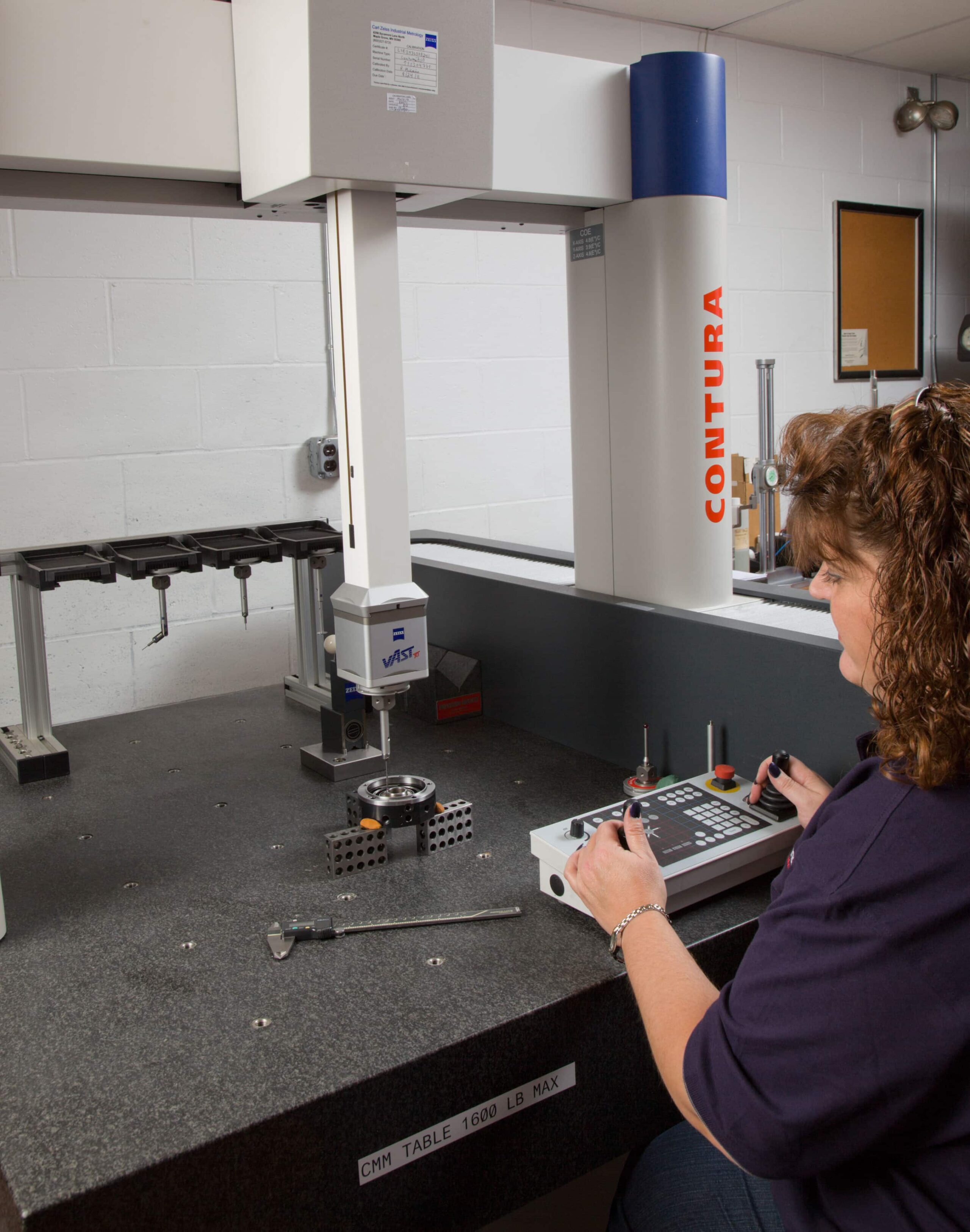 Engineer working with CNC machine
