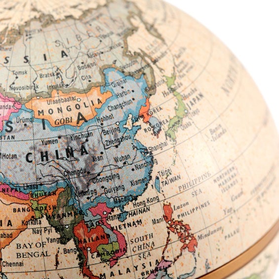 Close on globe displaying Asian continent